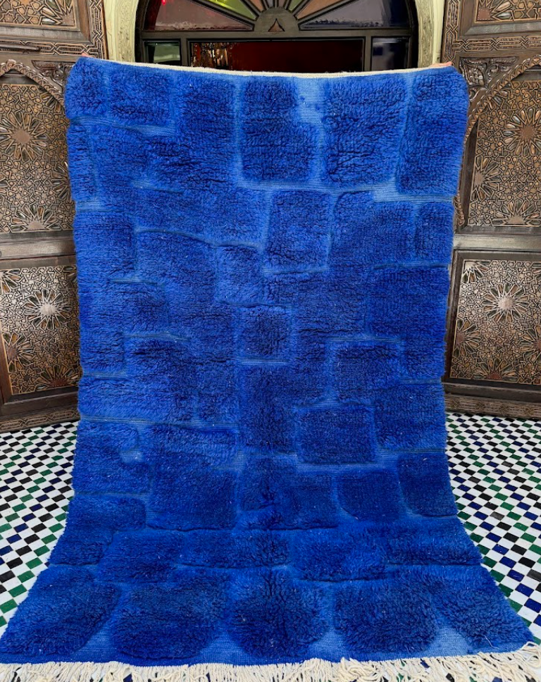 Dramatic view of a large Amazigh rug inspired by the Atlas Mountains